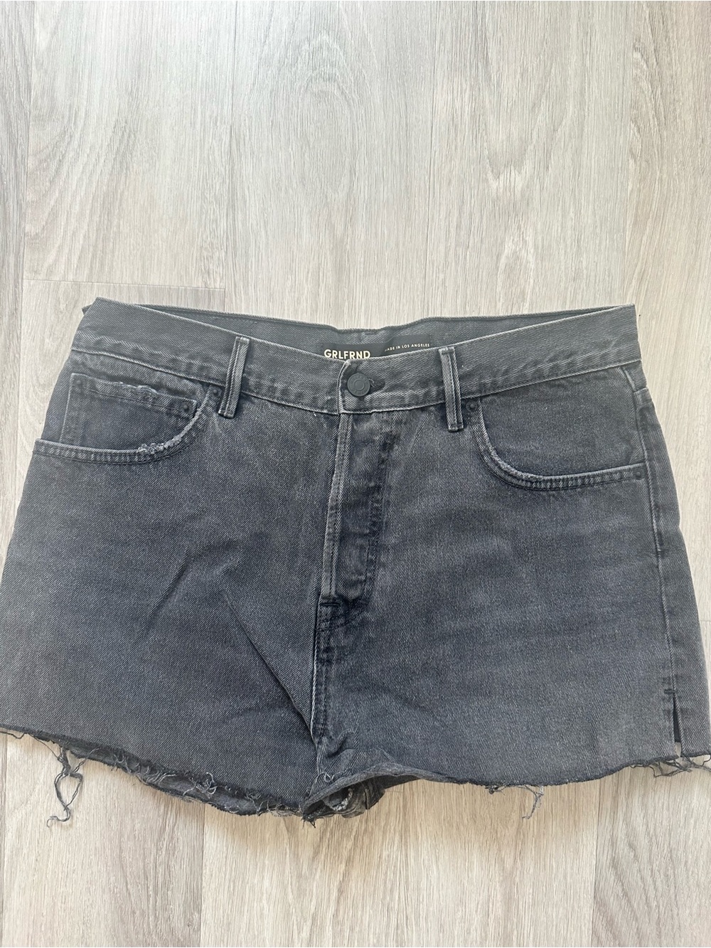 GRLFRND Washed Black High-Rise Denim Cutoff Shorts